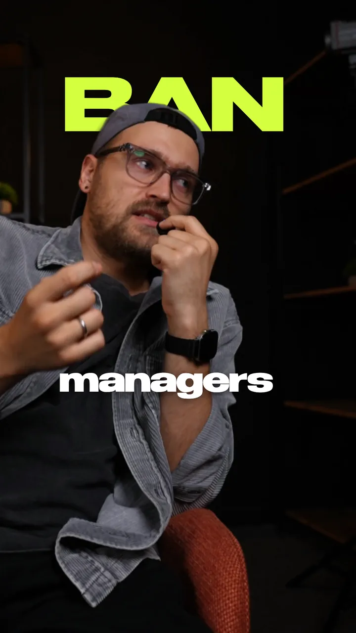 The same frame: the word “ban” big behind his head